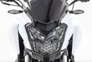 PROTECTOR DE FARO FIRE PARTS P/ DOMINAR 400 250